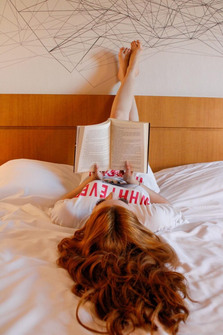a bed with a pillow and a headboard