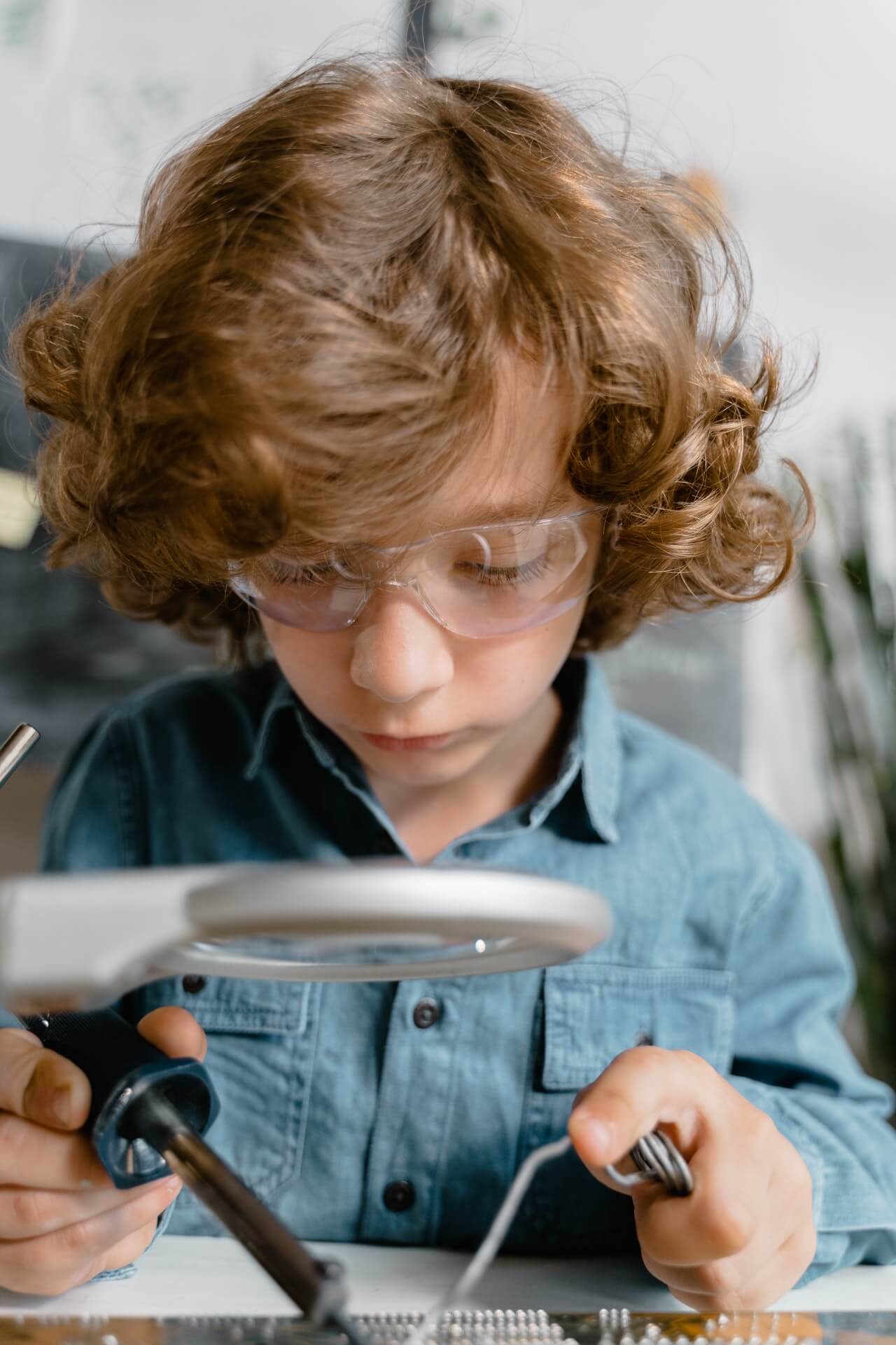 a person using a microscope