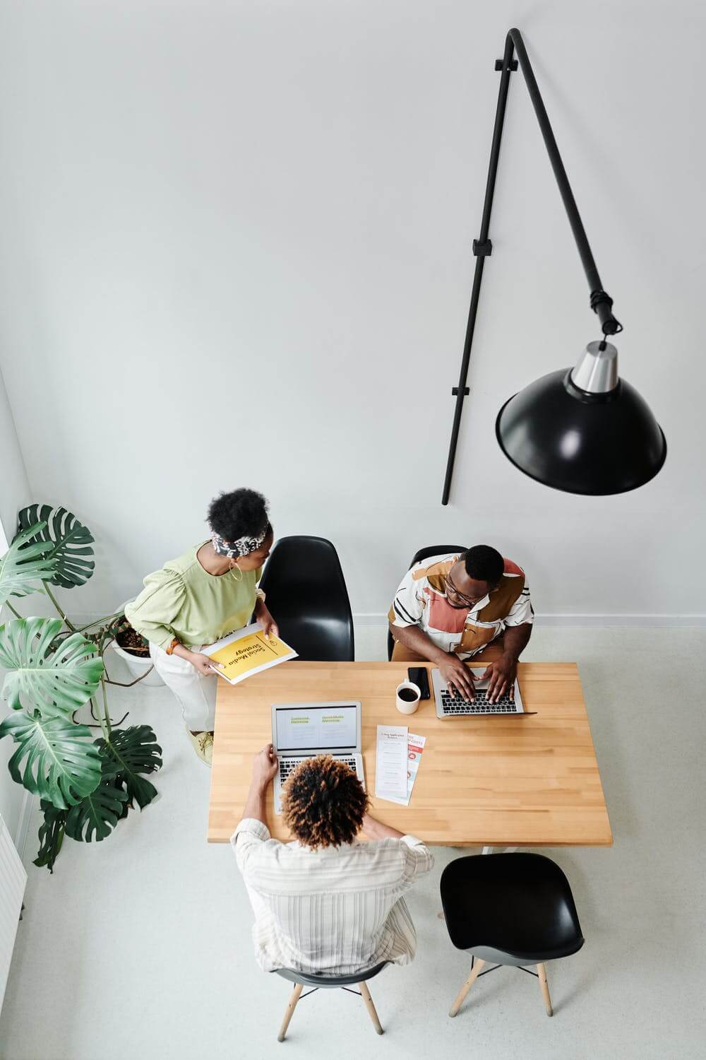 a group of people sitting around a table