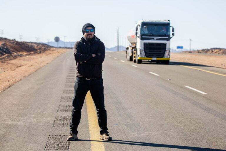 a man standing on a road