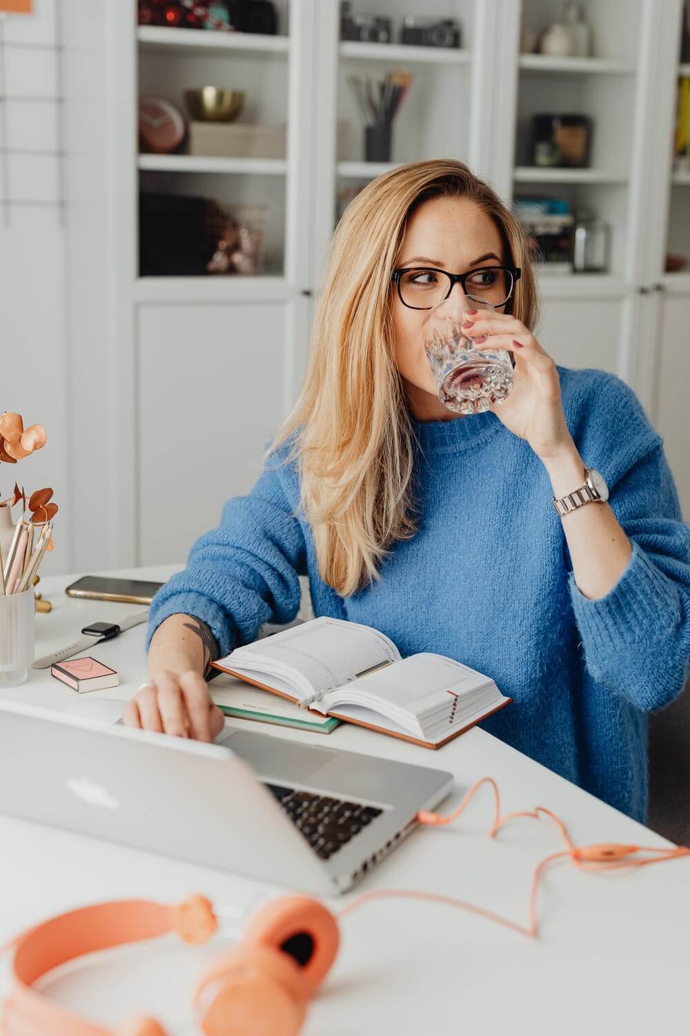 a woman eating a cookie